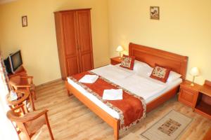 Postel nebo postele na pokoji v ubytování Hotel Járja