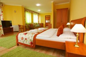 Postel nebo postele na pokoji v ubytování Hotel Járja