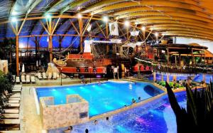 a large water park with a cruise ship at Apartmány MINATA in Liptovský Mikuláš
