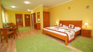 Postel nebo postele na pokoji v ubytování Hotel Járja