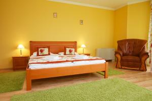 Postel nebo postele na pokoji v ubytování Hotel Járja