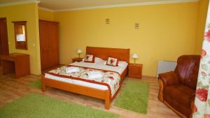 Postel nebo postele na pokoji v ubytování Hotel Járja