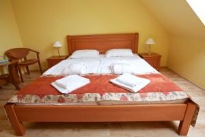 Postel nebo postele na pokoji v ubytování Hotel Járja