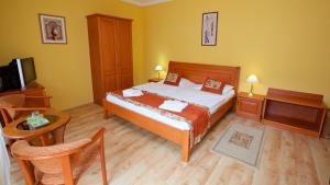 Postel nebo postele na pokoji v ubytování Hotel Járja