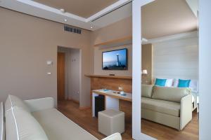 TV a/nebo společenská místnost v ubytování Hotel Concord