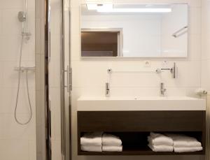 Ένα μπάνιο στο Fletcher Hotel-Restaurant Het Witte Huis