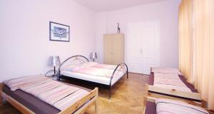 Postel nebo postele na pokoji v ubytování Raisa Apartments Fünkhgasse