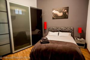 マラガにあるMontaño17のベッドルーム1室(ベッド1台付)