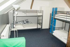 Postel nebo postele na pokoji v ubytování Hostel Franz Kafka
