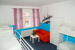 Postel nebo postele na pokoji v ubytování Hostel Franz Kafka