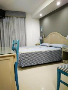 Krevet ili kreveti u jedinici u okviru objekta Hotel Pineda Playa