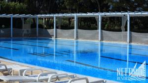 Bazén v ubytování Nettuno Resort nebo v jeho okolí