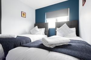 Letto o letti in una camera di Second Nest Waterloo
