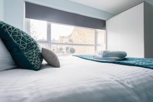 Letto o letti in una camera di Second Nest Waterloo