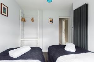Letto o letti in una camera di Second Nest Waterloo