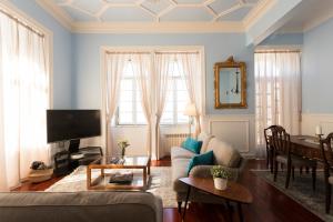 Телевизор и/или развлекательный центр в Ericeira Soul Guesthouse