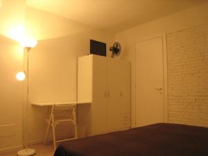 Postel nebo postele na pokoji v ubytování Rinathos Guesthouse