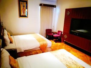 Voodi või voodid majutusasutuse Borabora B&B toas