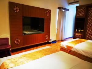 Voodi või voodid majutusasutuse Borabora B&B toas
