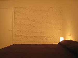 Postel nebo postele na pokoji v ubytování Rinathos Guesthouse