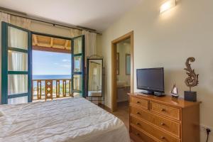 Giường trong phòng chung tại Okeanos Villa front line San Blas +129 ảnh