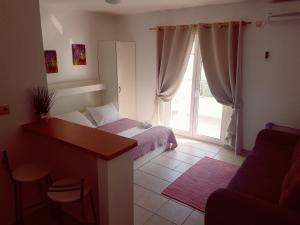 Posteľ alebo postele v izbe v ubytovaní Apartment Luna