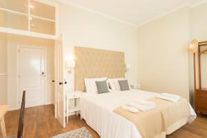 Кровать или кровати в номере Ericeira Soul Guesthouse