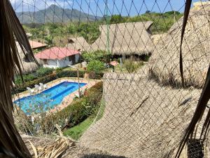 
Uitzicht op het zwembad bij Palomino Breeze Hostal of in de buurt
