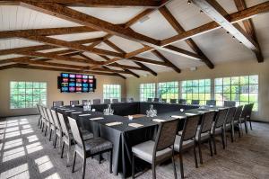 a large conference room with a long table and chairs at The Inn at Pasatiempo in Santa Cruz +35 photos