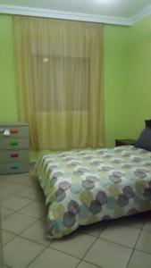 Llit o llits en una habitació de Agadir jet sakane 1 er étage