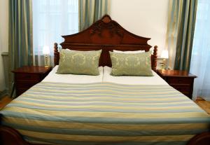 Letto o letti in una camera di Boutique Hotel KRISTOFS