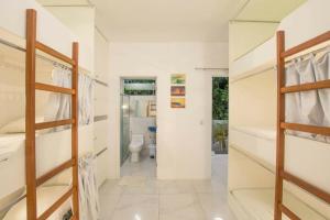 Cama ou camas em um quarto em Galinha d'Angola