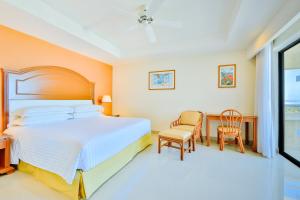 Voodi või voodid majutusasutuse Occidental Tucancún - All Inclusive toas