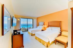 Voodi või voodid majutusasutuse Occidental Tucancún - All Inclusive toas