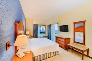 Voodi või voodid majutusasutuse Occidental Tucancún - All Inclusive toas