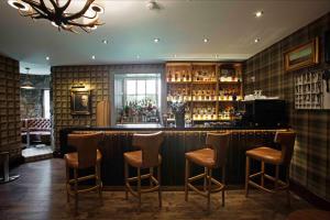 The lounge or bar area at Meldrum House Hotel Golf And Country Estate 