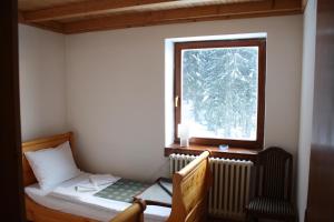 Ένα ή περισσότερα κρεβάτια σε δωμάτιο στο Villa Kostic Kopaonik