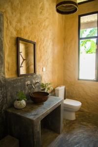 Uma casa de banho em Lime & Co Midi