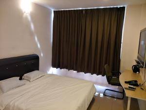 Postel nebo postele na pokoji v ubytování Anderson Hotel