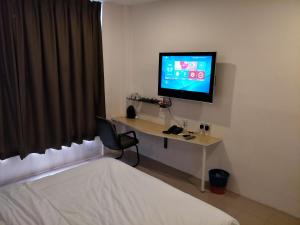 TV a/nebo společenská místnost v ubytování Anderson Hotel + 34 fotografií