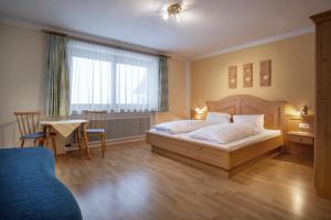 Łóżko lub łóżka w pokoju w obiekcie Ferienhof Stadlpoint