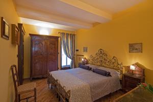 Postel nebo postele na pokoji v ubytování B&B Contrada dei Giardini