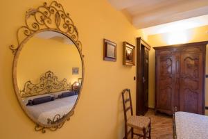 Postel nebo postele na pokoji v ubytování B&B Contrada dei Giardini