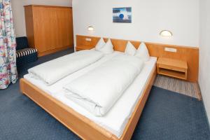 Postel nebo postele na pokoji v ubytování Landhaus Schiestl