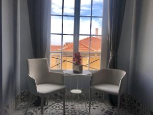 Khu vực ghế ngồi tại Apartments Monaco