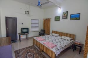 Gulta vai gultas numurā naktsmītnē Iora Guest House