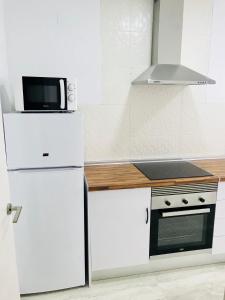 Dapur atau dapur kecil di Alona Home