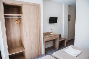 Postel nebo postele na pokoji v ubytování Hotel Celymar