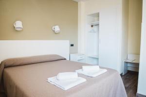 Postel nebo postele na pokoji v ubytování Hotel Celymar