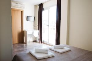 Postel nebo postele na pokoji v ubytování Hotel Celymar
